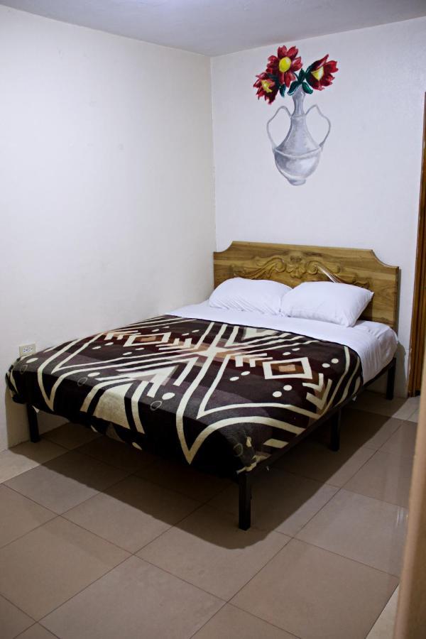 Hotel Cuencano Hogar Bagian luar foto